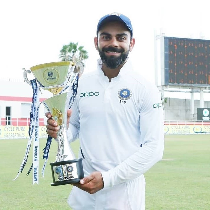 cricketer virat kohli photo after win a cup